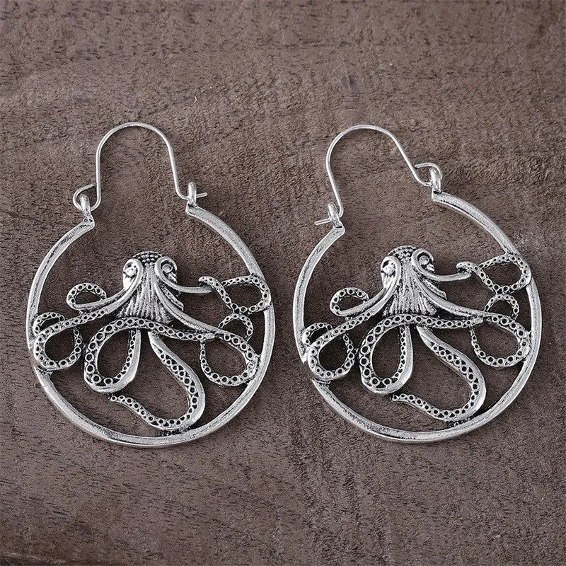 Vintage octopus earrings with antique silver electroplated finish and detailed animal modelling