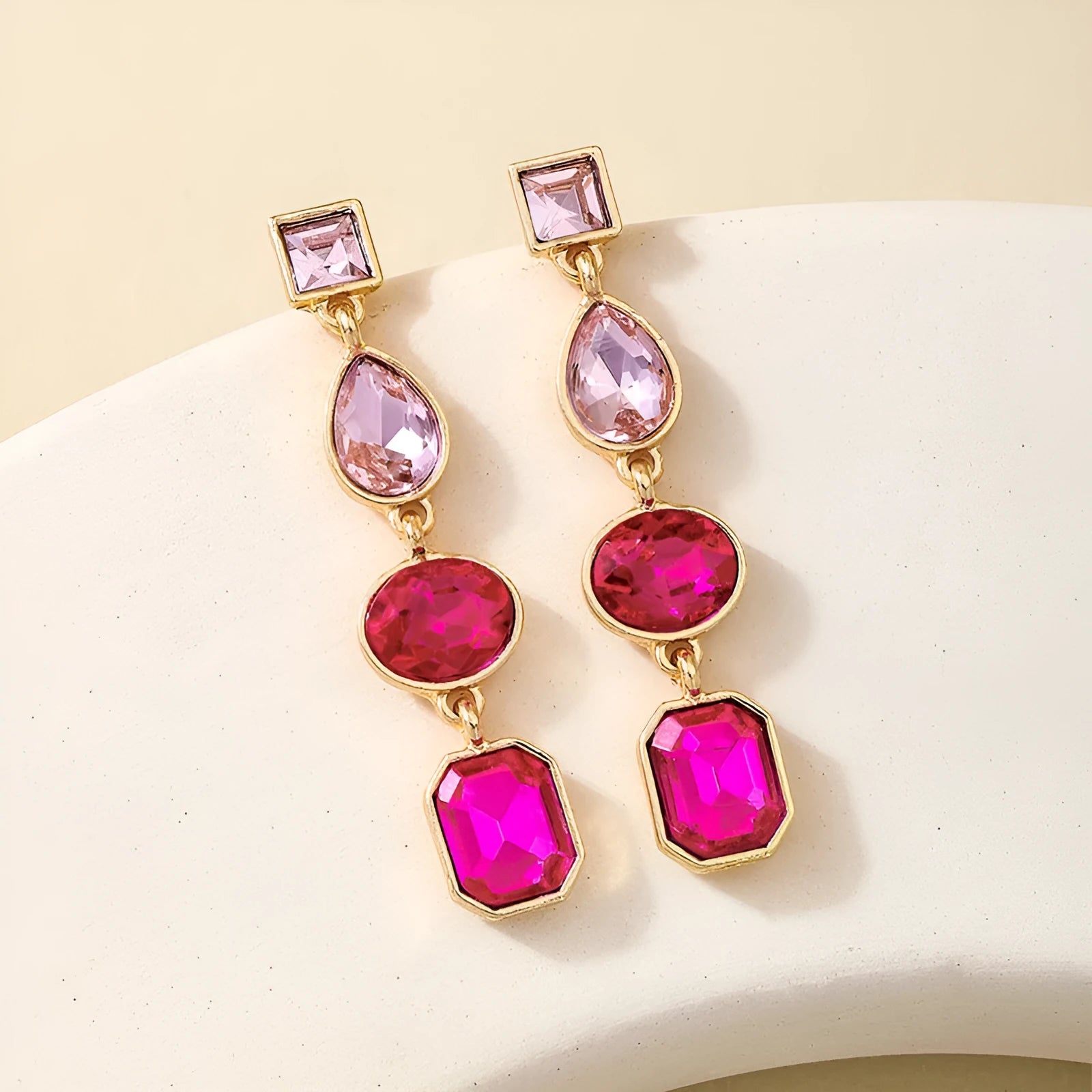 Women's geometric water drop rhinestone ear studs in royal blue alloy with silver tone setting