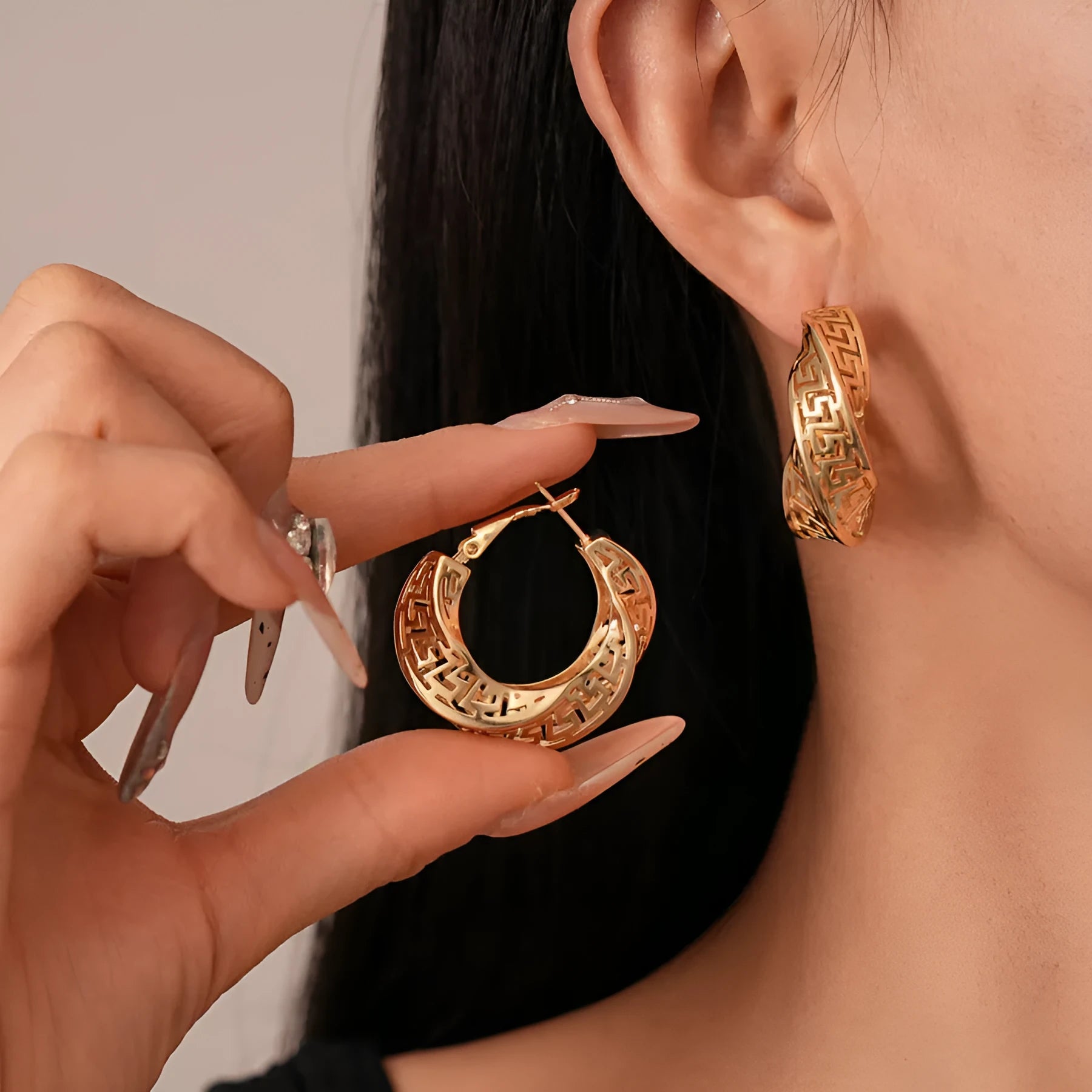 Women's geometric twisted round hollow stud earrings in silver needle-gold or silver needle-silver finish
