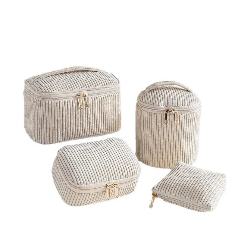 Four-piece polyester makeup bag set in cube style with modern simple design