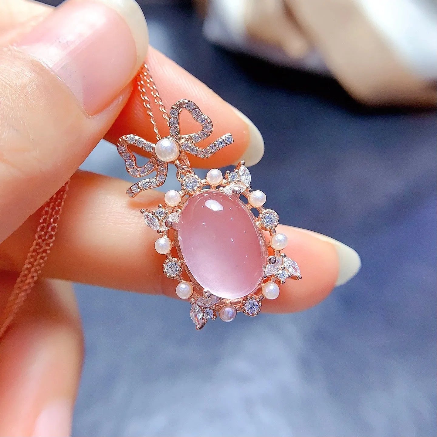 Geometric rose quartz pendant necklace in rose gold plated silver on a chain