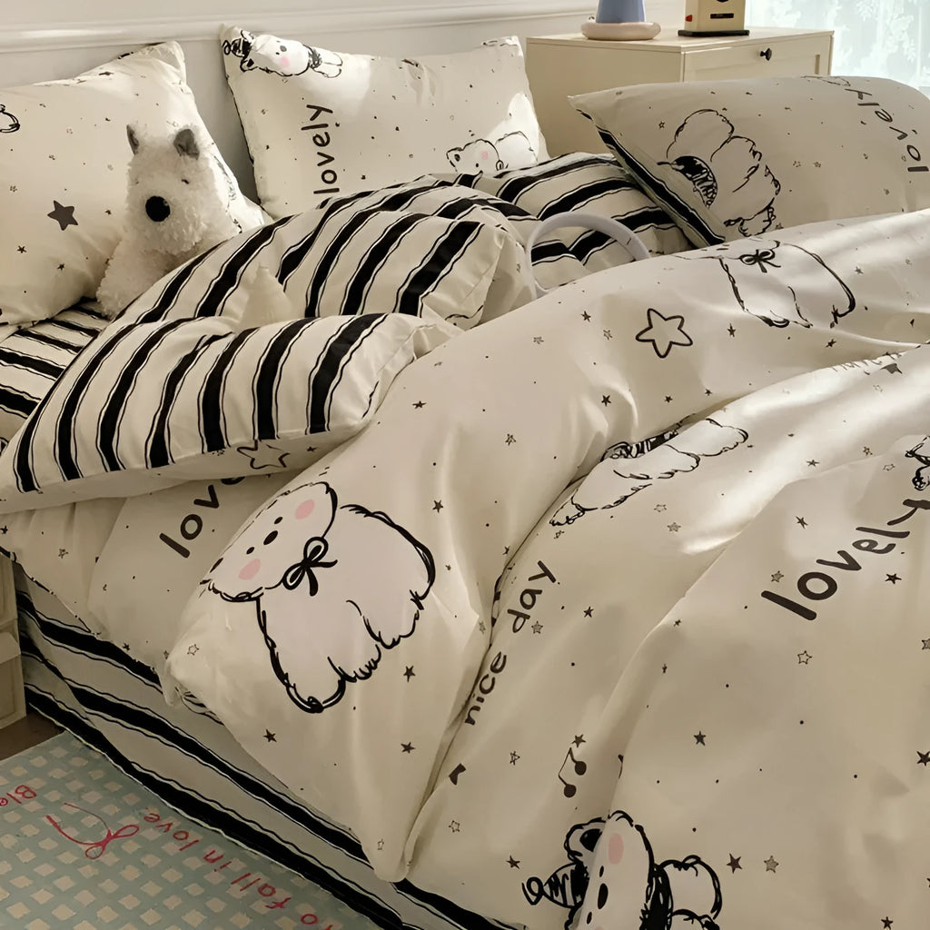 Cartoon dog pattern pure cotton quilt cover and pillowcases from a four-piece bedding set.