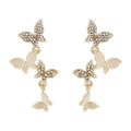 Women's gold-coloured copper butterfly earrings with four drop charms