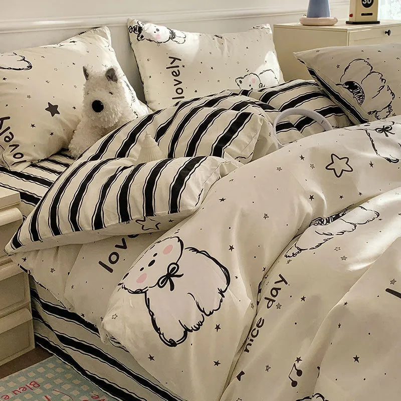 Cartoon dog pattern pure cotton quilt cover and pillowcases from a four-piece bedding set.