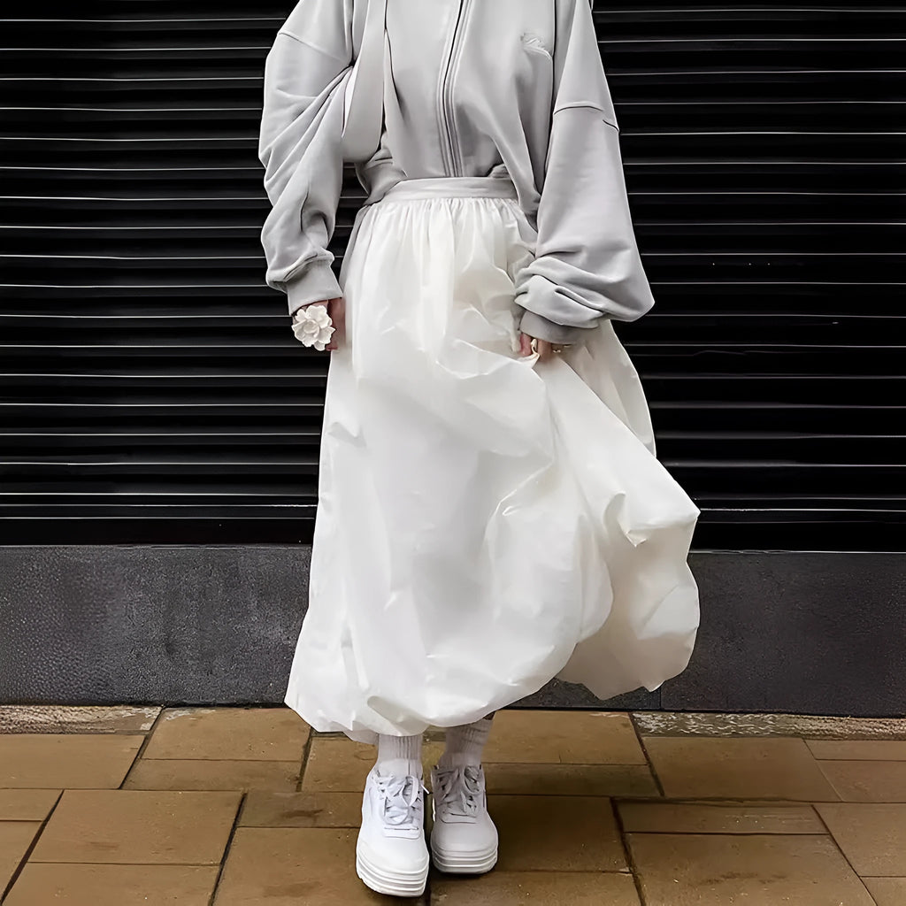 Women's cotton long skirt in solid white colour showing front view and length