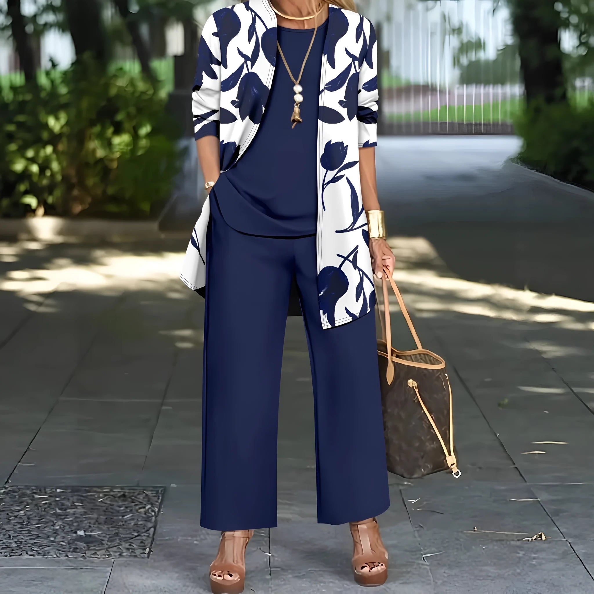 Women's blue Japanese Korean style three-piece suit comprising a long sleeve coat, vest, and trousers.