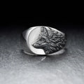 Men's silver geometric wolf head alloy ring shown on a finger, showcasing its retro design.