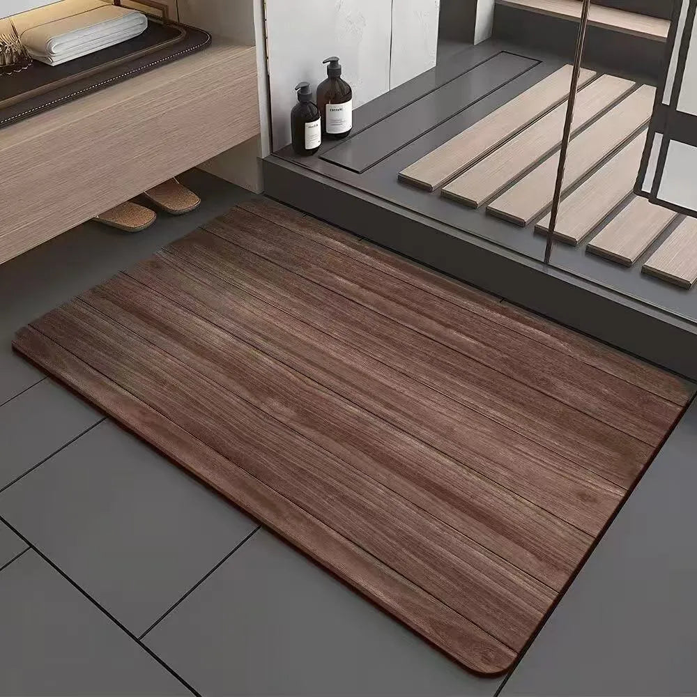 Square diatomite bathroom floor mat with geometric wood grain pattern, shown in a washroom setting.