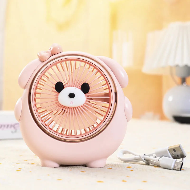 Cute dog-themed USB desk fan for pets with three speed settings on a desktop
