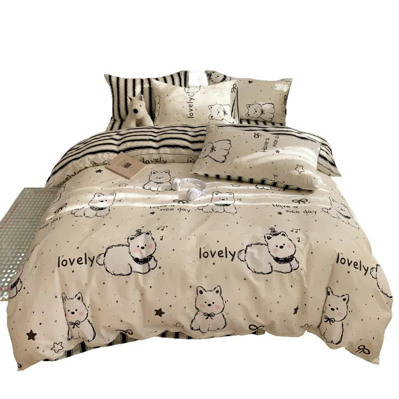 Cartoon dog pattern pure cotton quilt cover and pillowcases from a four-piece bedding set.