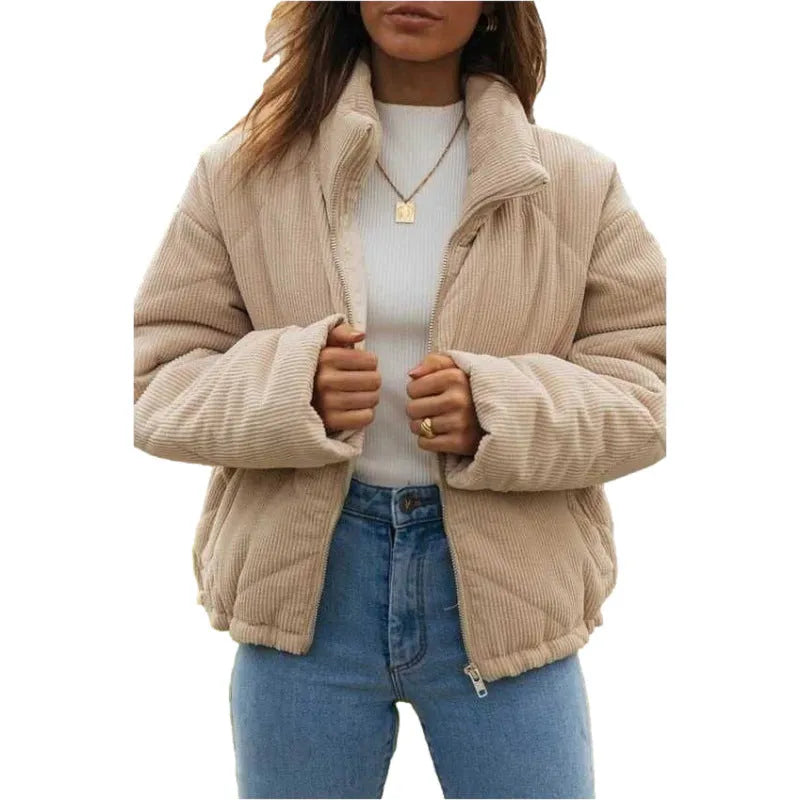 Apricot coloured women's corduroy jacket with stand collar and front zip, showing textured fabric.
