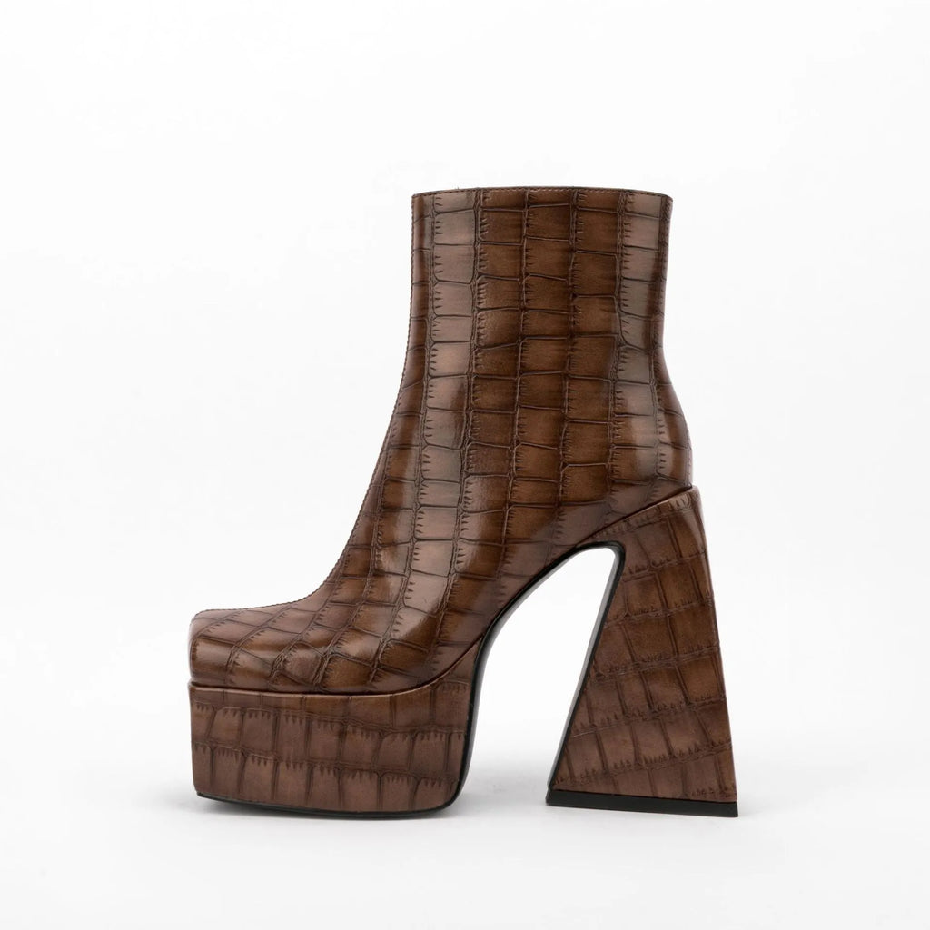 Women's artificial PU ankle boots with high heel above 8cm in beige, showing solid colour design.