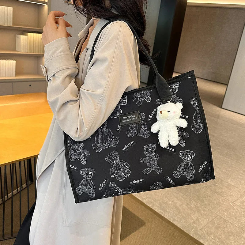 Women's black canvas tote bag with rhombus pattern print and large capacity design