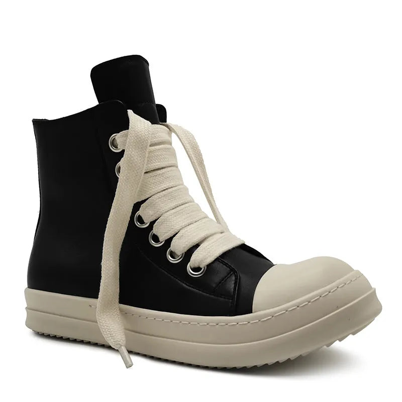 Genuine leather high-top sneakers with side zipper in black, shown on a casual outfit.