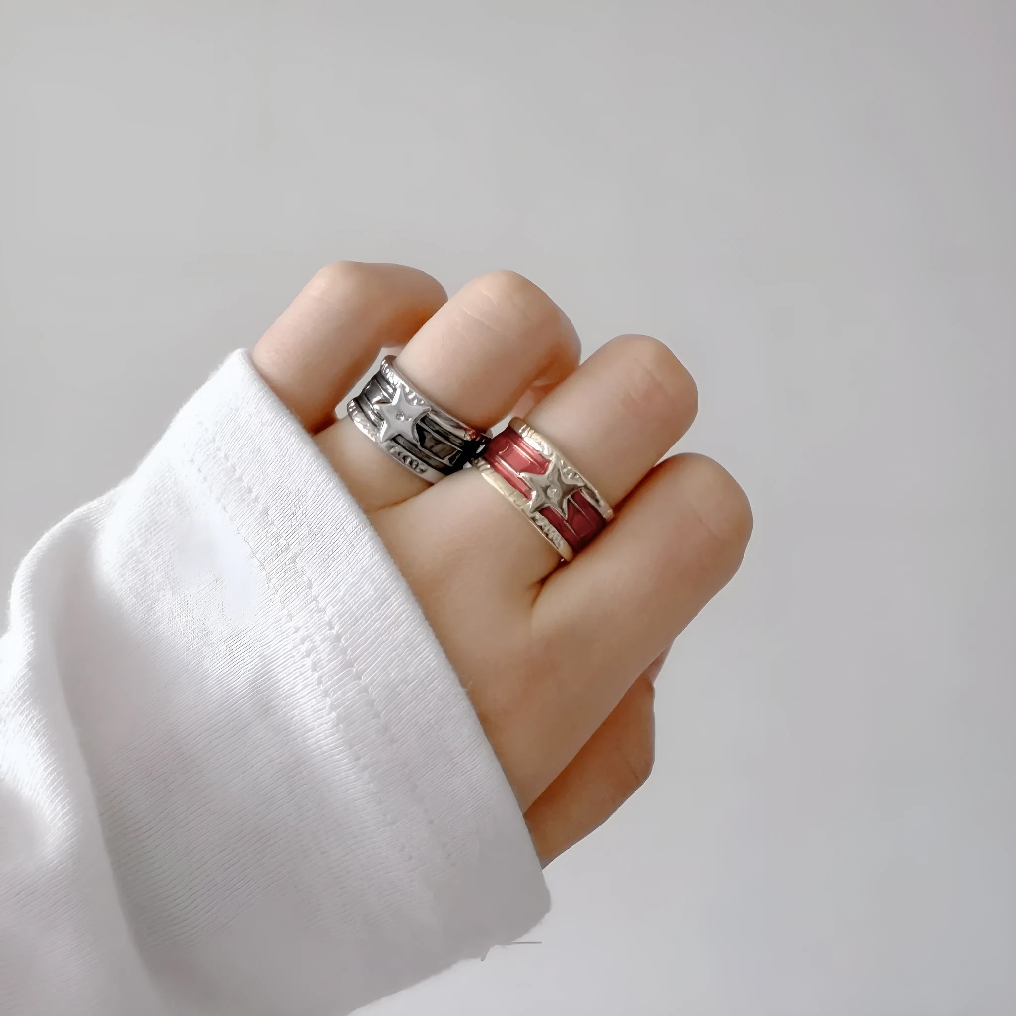 Geometric adjustable drop oil ring in copper with electroplated finish and linear detailing