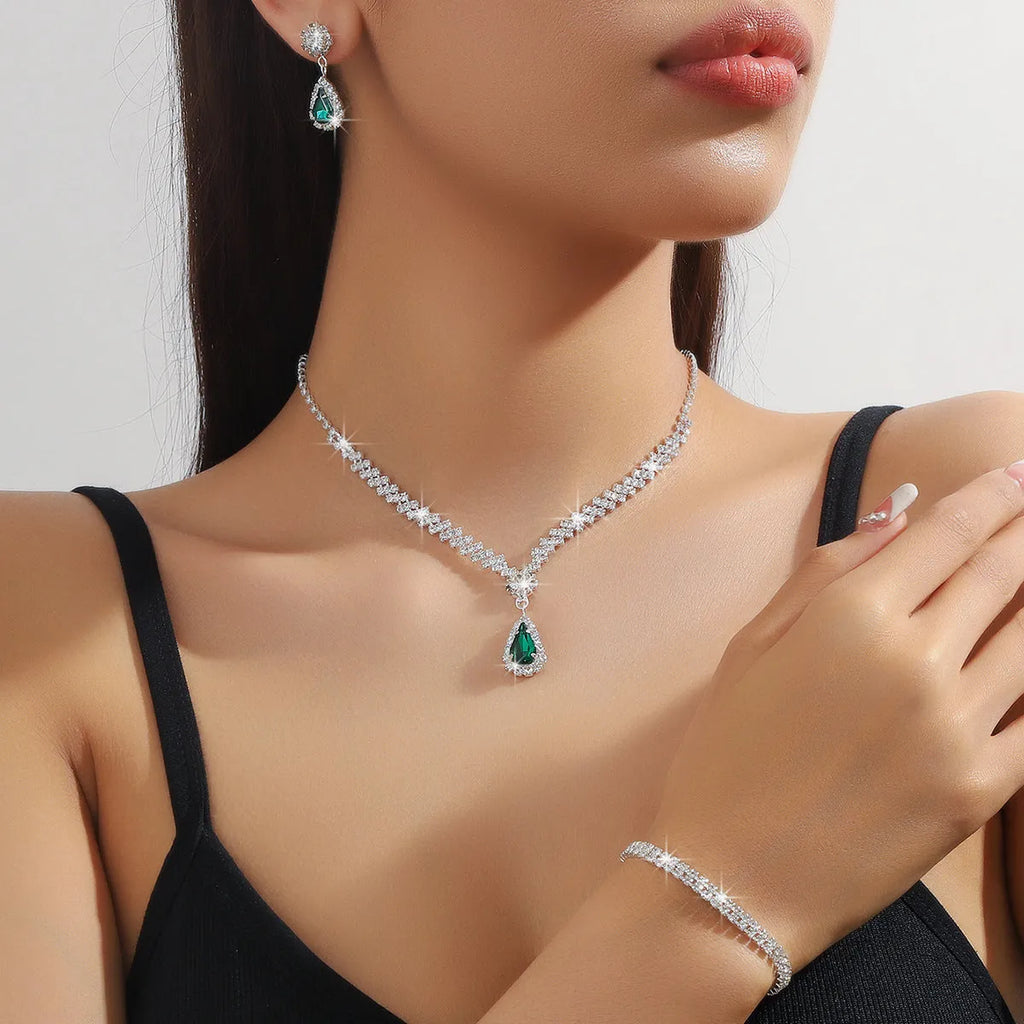 Claw chain necklace and earrings set with drop-shaped rhinestones in choice of five colours