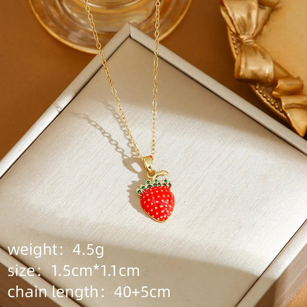 Titanium steel women's necklace with golden cherry pendant and O-ring chain design