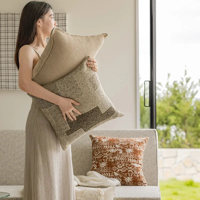 Solid colour sofa cushion pillow on a chair, showing 30x50cm and 45x45cm size options.