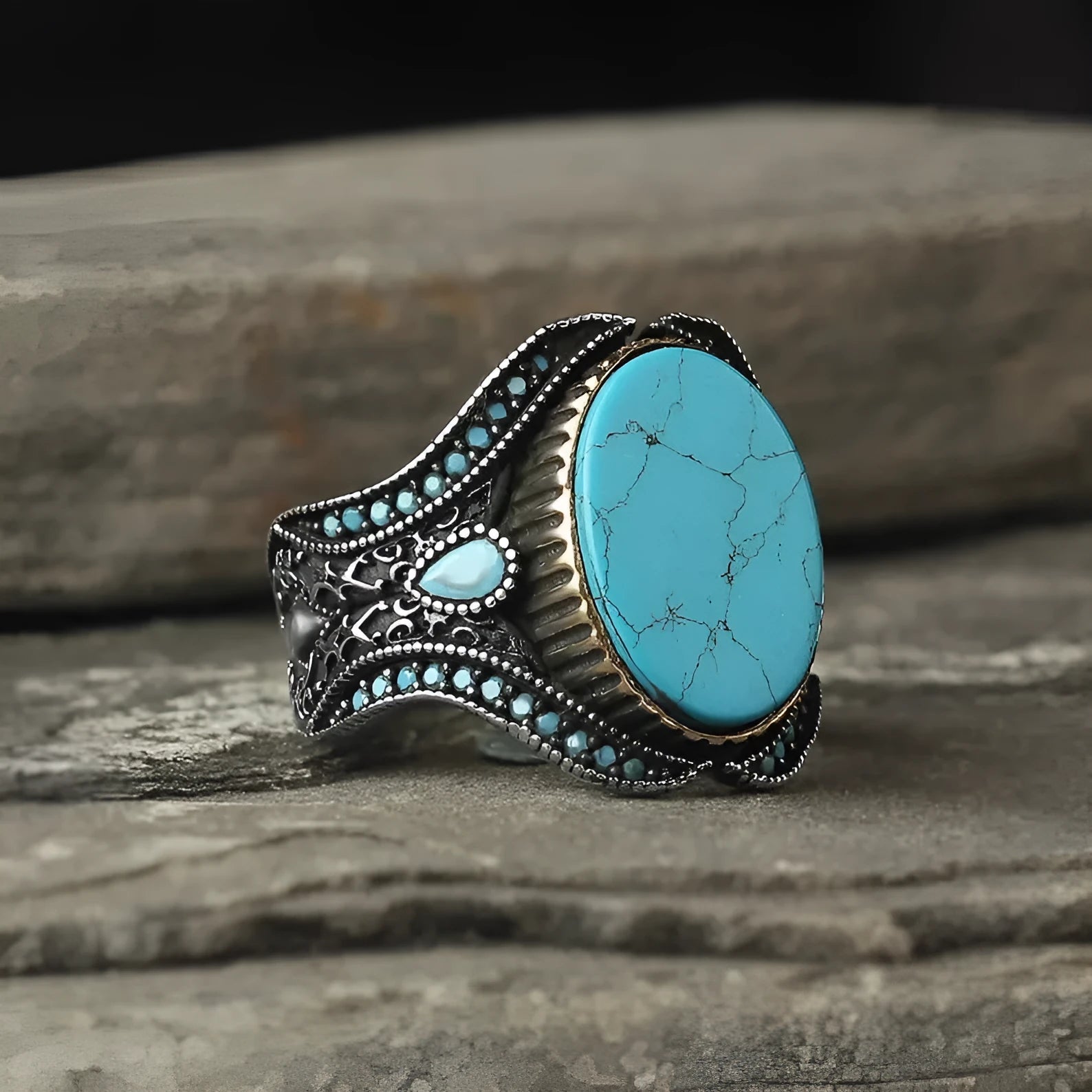 Men's round turquoise ring with antique silver alloy finish showing simple stone setting