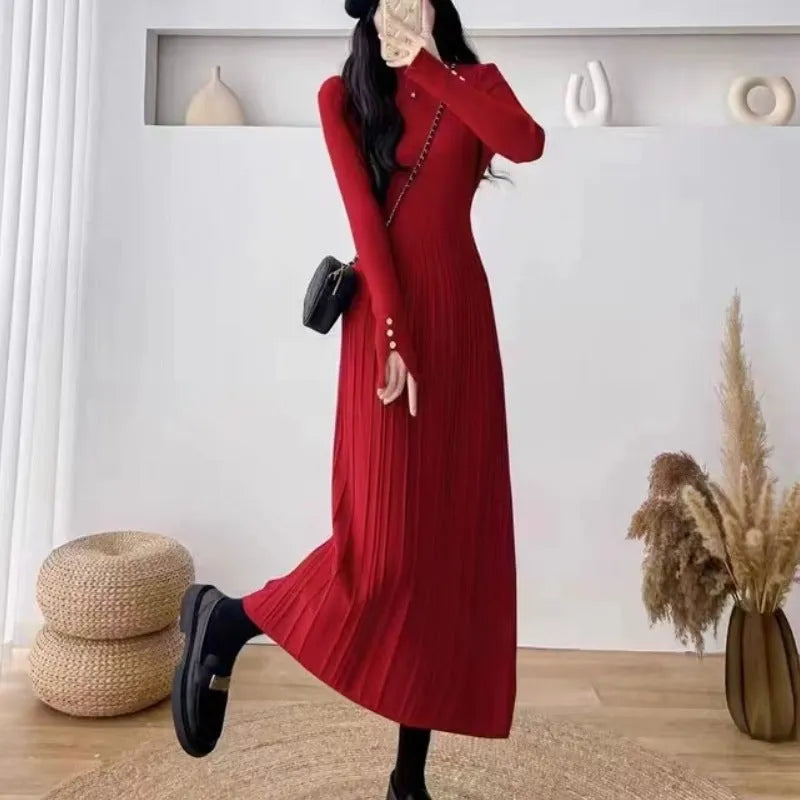 A women's solid colour A-line woollen skirt with a high waist, shown in a mid-length below-the-knee cut.
