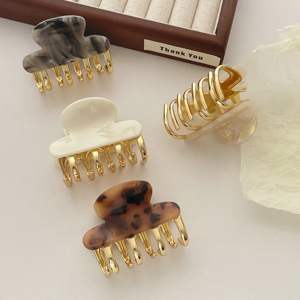 Set of four dopamine retro acetate hair barrettes in R08 colours with medium metal grip