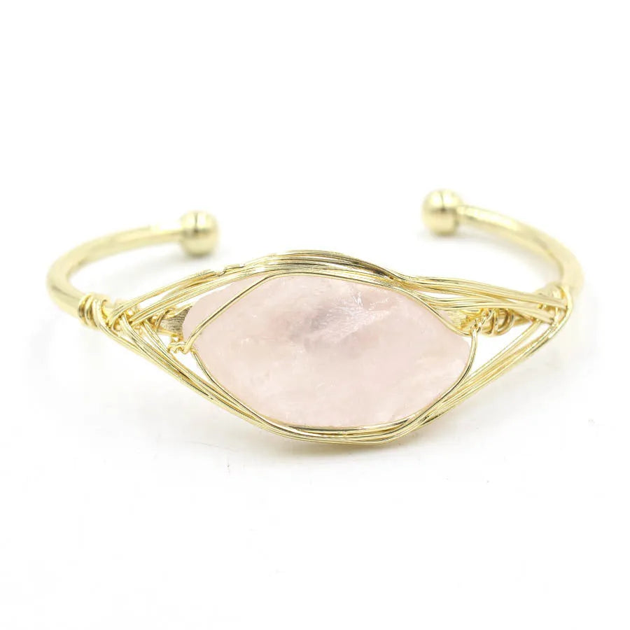 Natural raw gemstone bracelet with winding crystal design showing 8mm stones in various colours