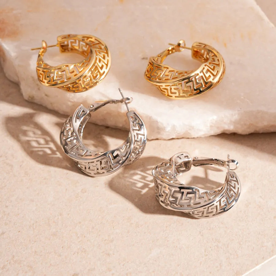 Women's geometric twisted round hollow stud earrings in silver needle-gold or silver needle-silver finish