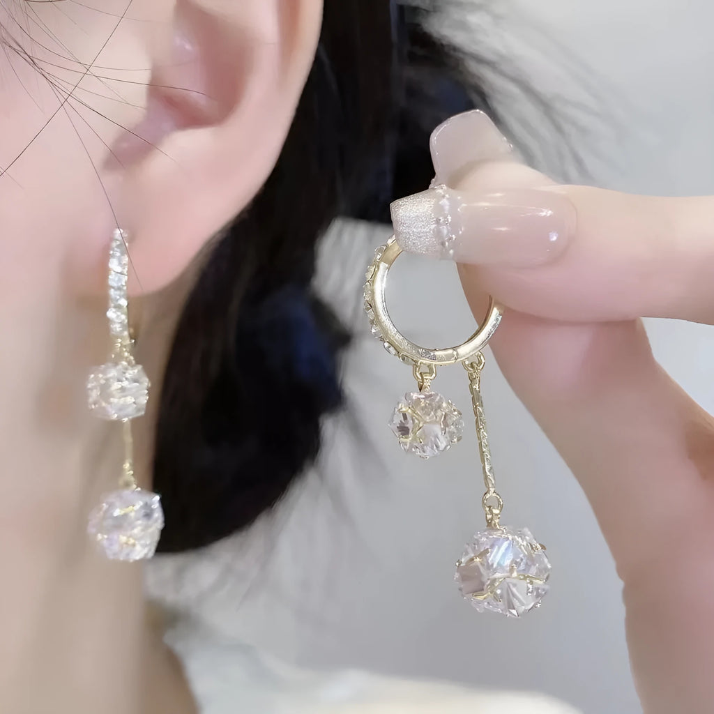 Women's confession balloon earrings with tassel and rhinestone ball pendants in silver colour