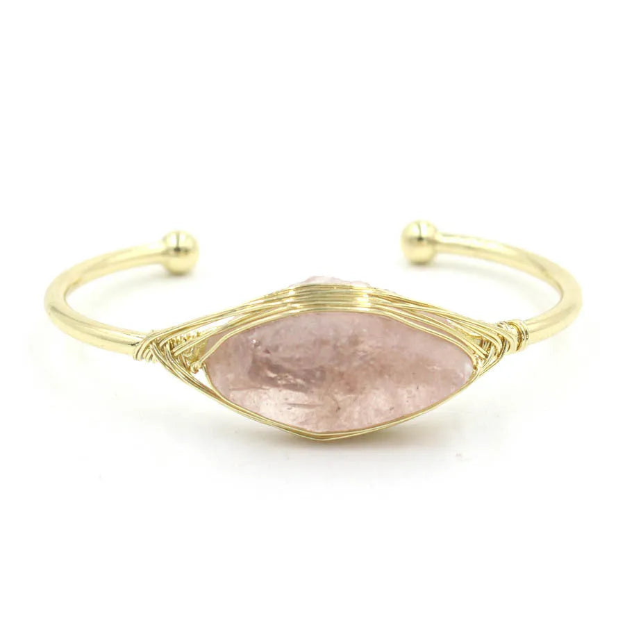 Natural raw gemstone bracelet with winding crystal design showing 8mm stones in various colours