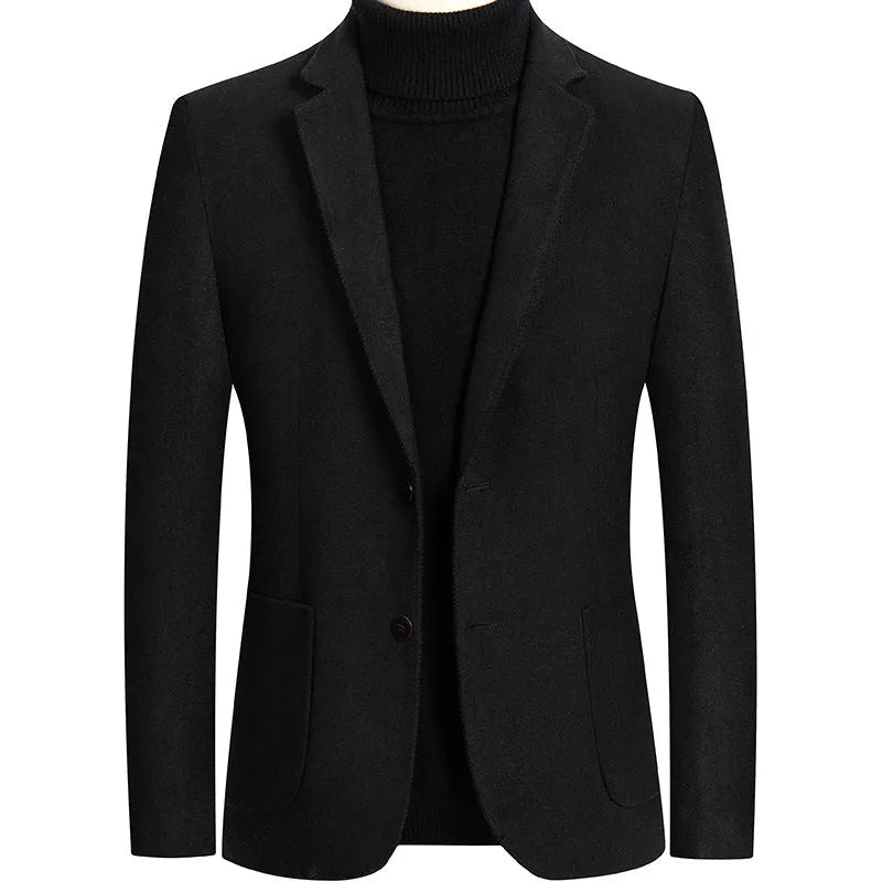Men's slim fit wool suit jacket in grey on a hanger, showing notch lapel and button front.