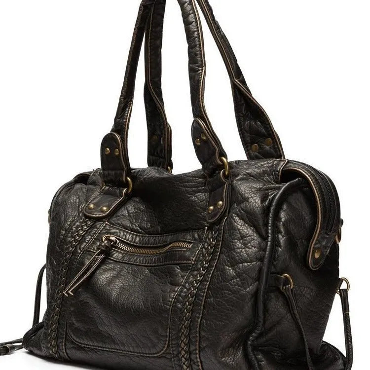 Women's retro motorcycle shoulder messenger bag in soft PU leather with woven design and internal organisation pockets