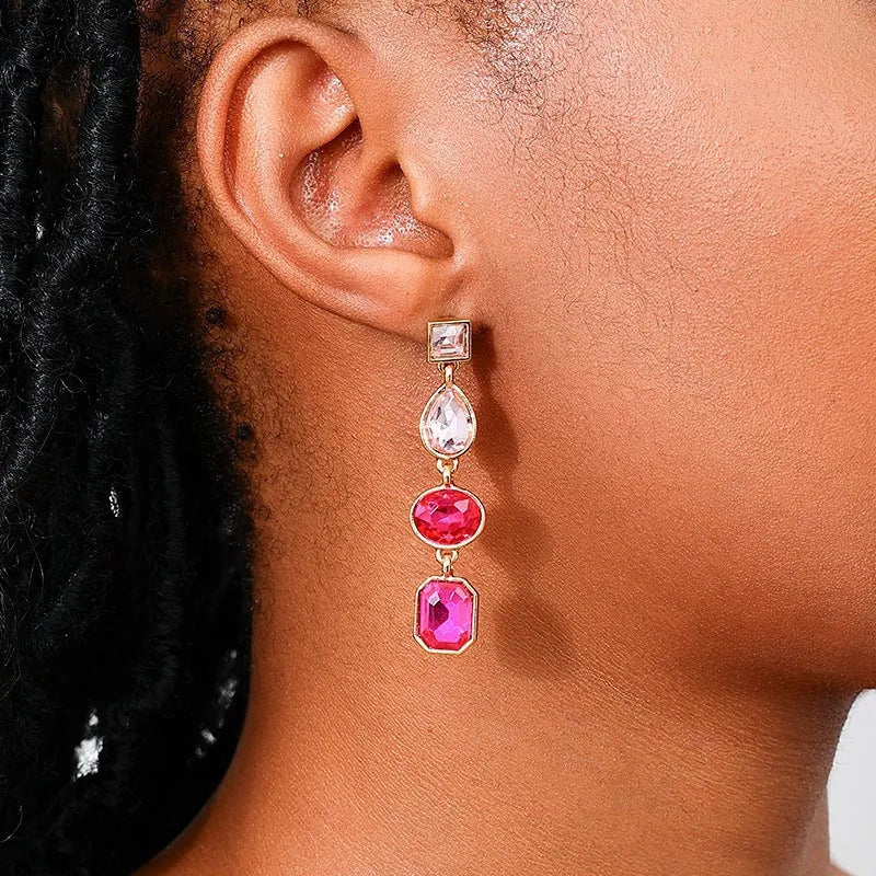 Women's geometric water drop rhinestone ear studs in royal blue alloy with silver tone setting