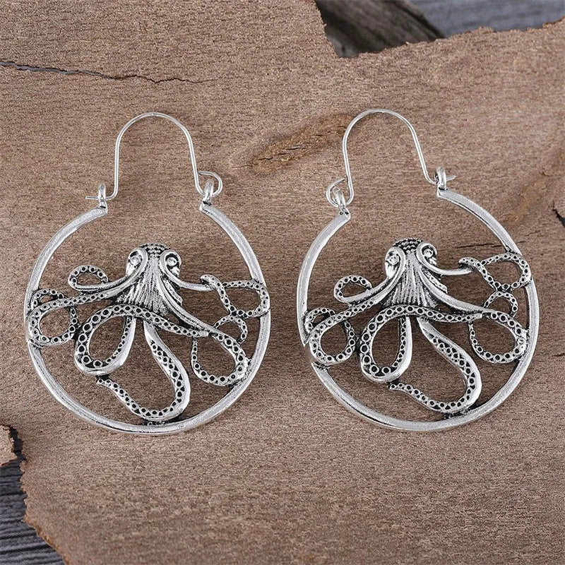 Vintage octopus earrings with antique silver electroplated finish and detailed animal modelling