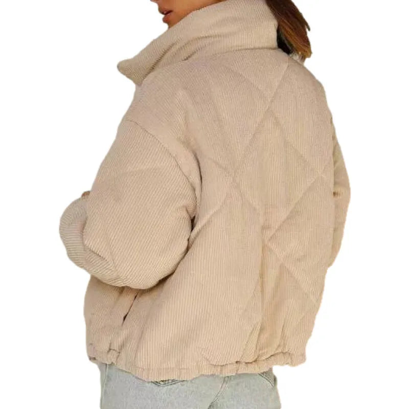 Apricot coloured women's corduroy jacket with stand collar and front zip, showing textured fabric.