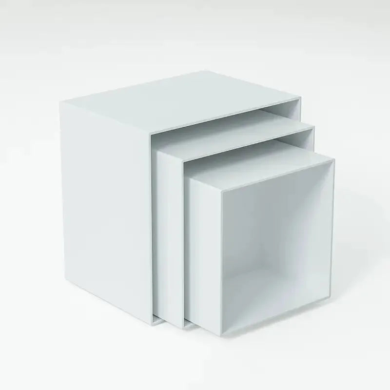 White plastic cube dessert display stand with six individual pieces for cake and confectionery presentation