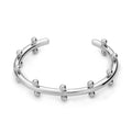 C-shaped textured rivet bean bead charm bracelet in gold, steel, or two-tone finish on an alloy chain.
