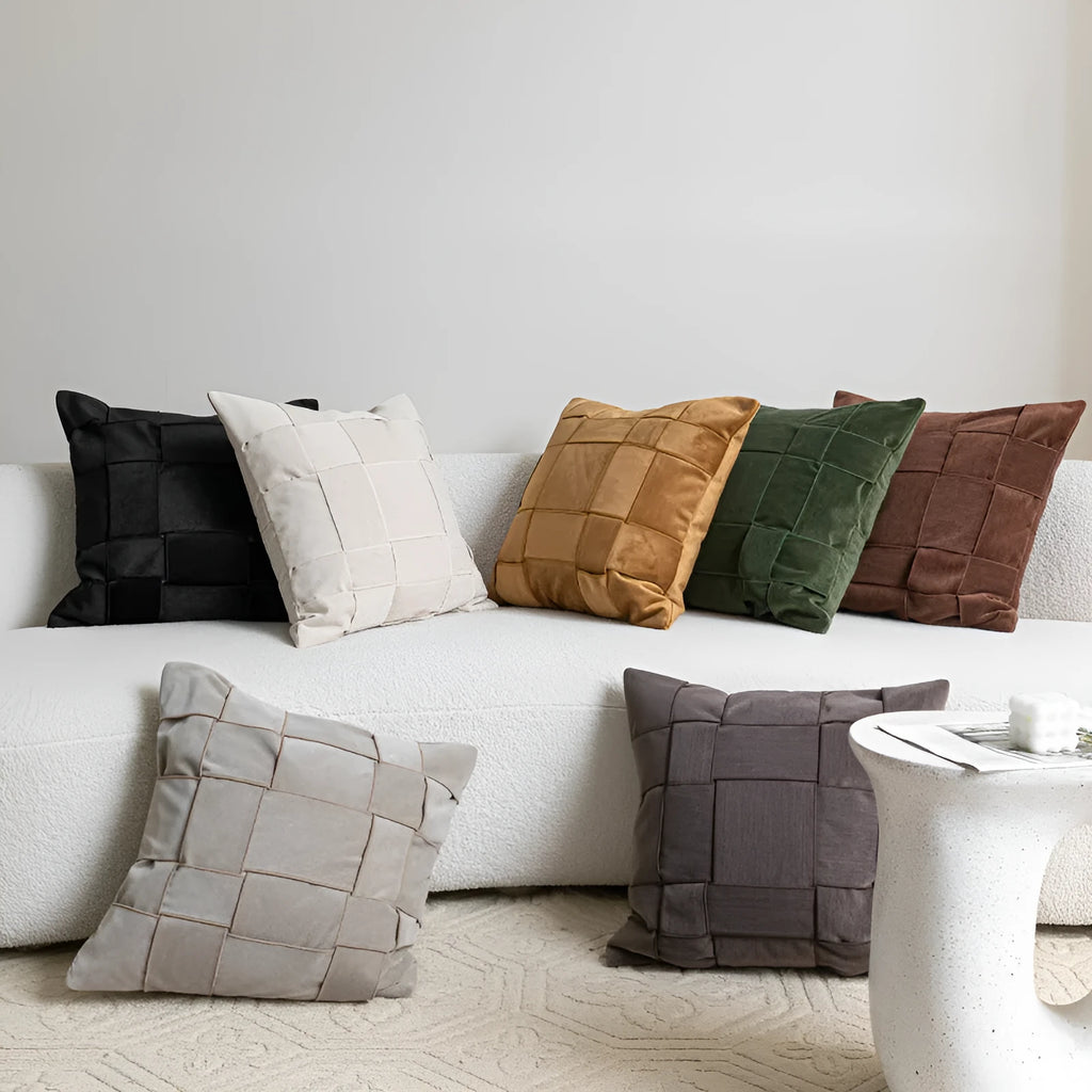 Square 50x50cm chenille woven pillow cushion on a sofa in a choice of seven colours.