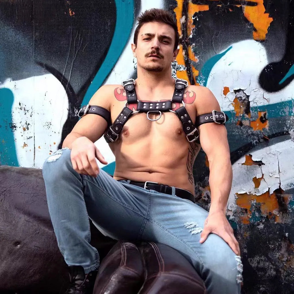 Black leather chest muscle bondage strap with metal buckle adjustment for adult costume wear
