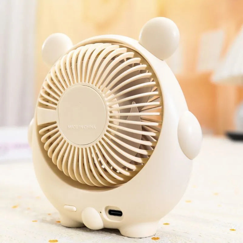 Cute dog-themed USB desk fan for pets with three speed settings on a desktop