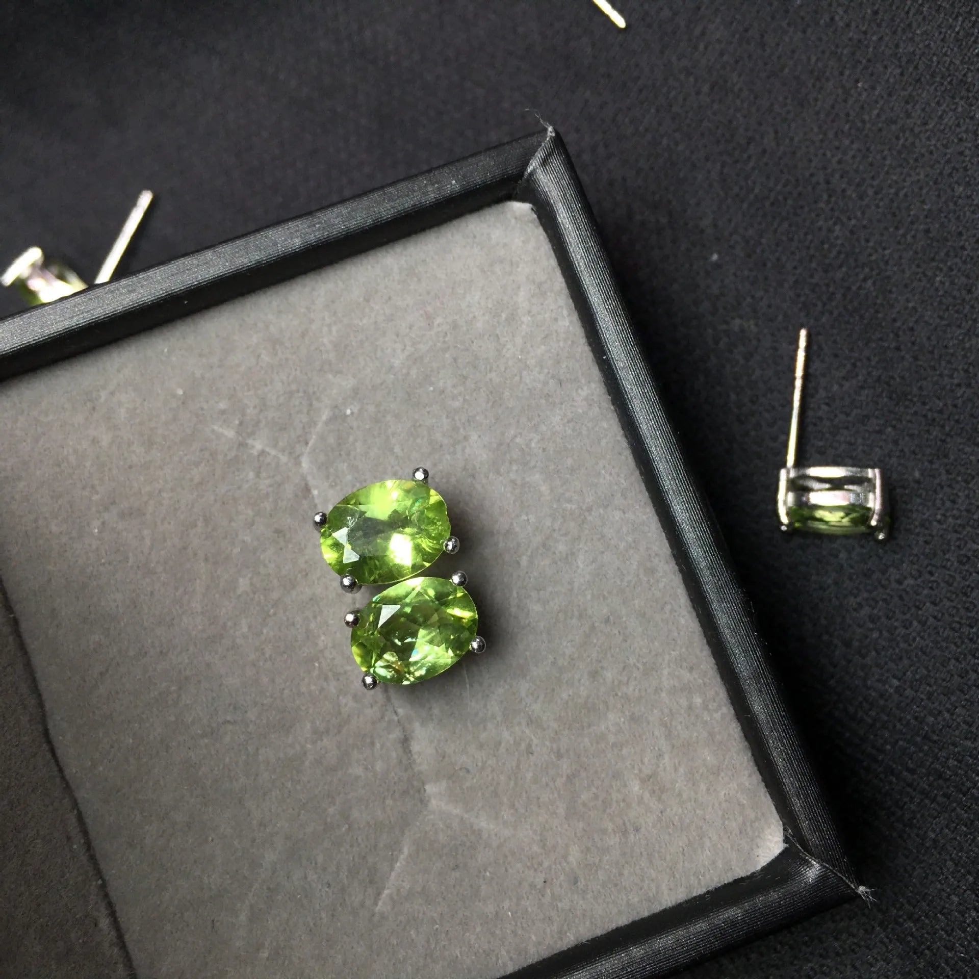Natural grass green olivine stud earrings in S925 sterling silver with 6x8mm oval stones.