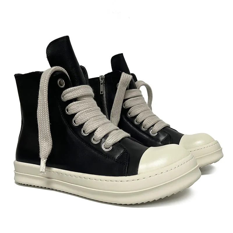 Genuine leather high-top sneakers with side zipper in black, shown on a casual outfit.