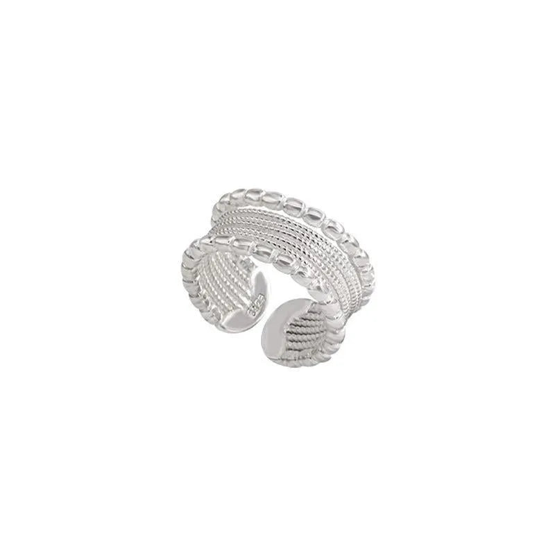 Copper alloy adjustable opening ring with woven twisted multilayer geometry design
