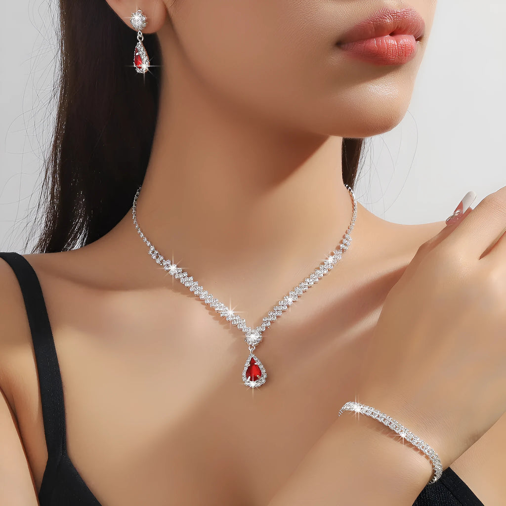 Claw chain necklace and earrings set with drop-shaped rhinestones in choice of five colours