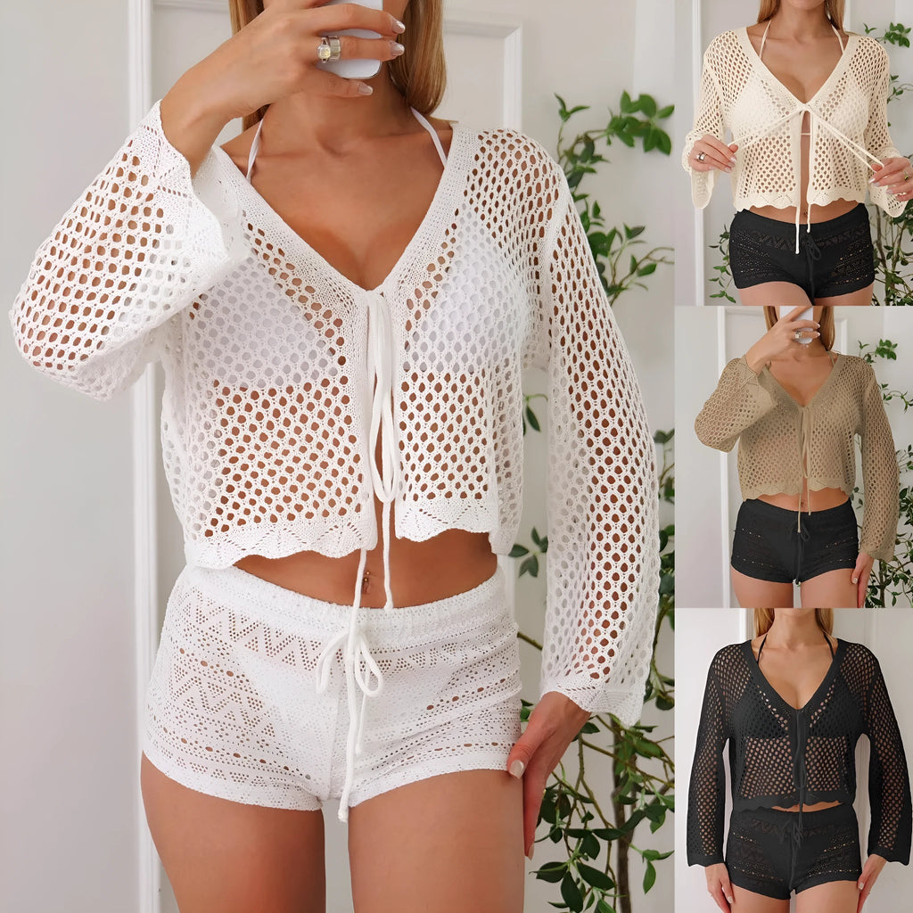 Women's short length cardigan blouse with nine-quarter bell sleeves in a hollow woven imitation cotton fabric.