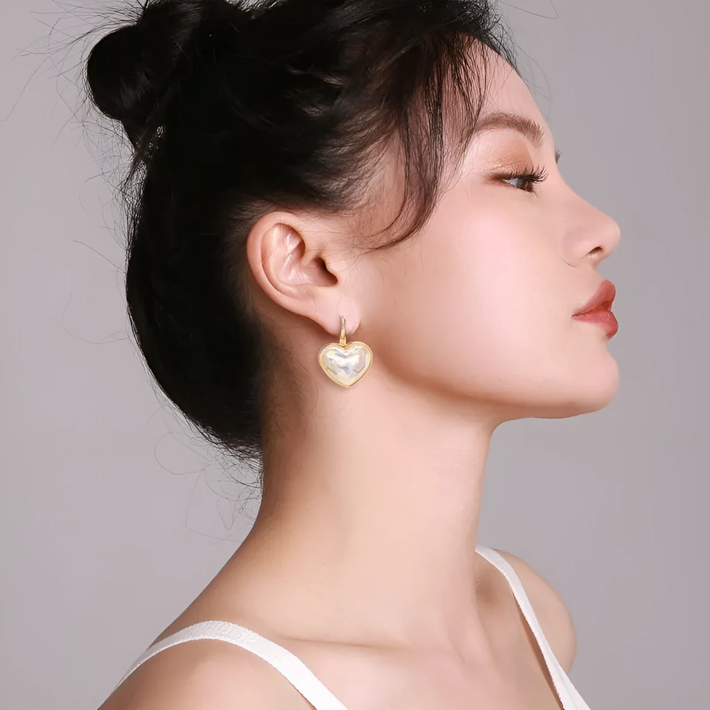 Gold-coloured alloy ear clips with summer love design and clip-on mechanism
