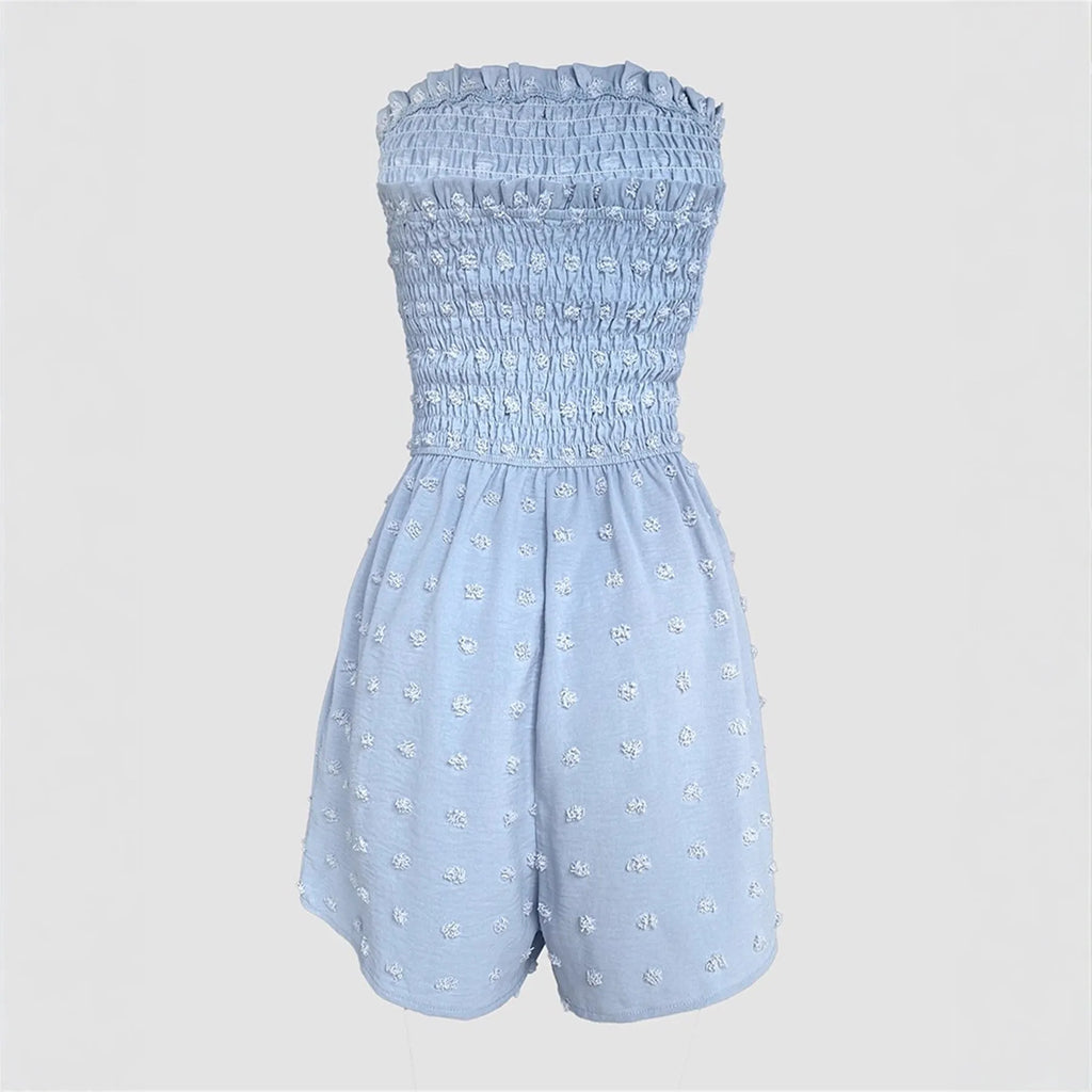 Blue women's off-shoulder sleeveless jumpsuit with button detail on mannequin