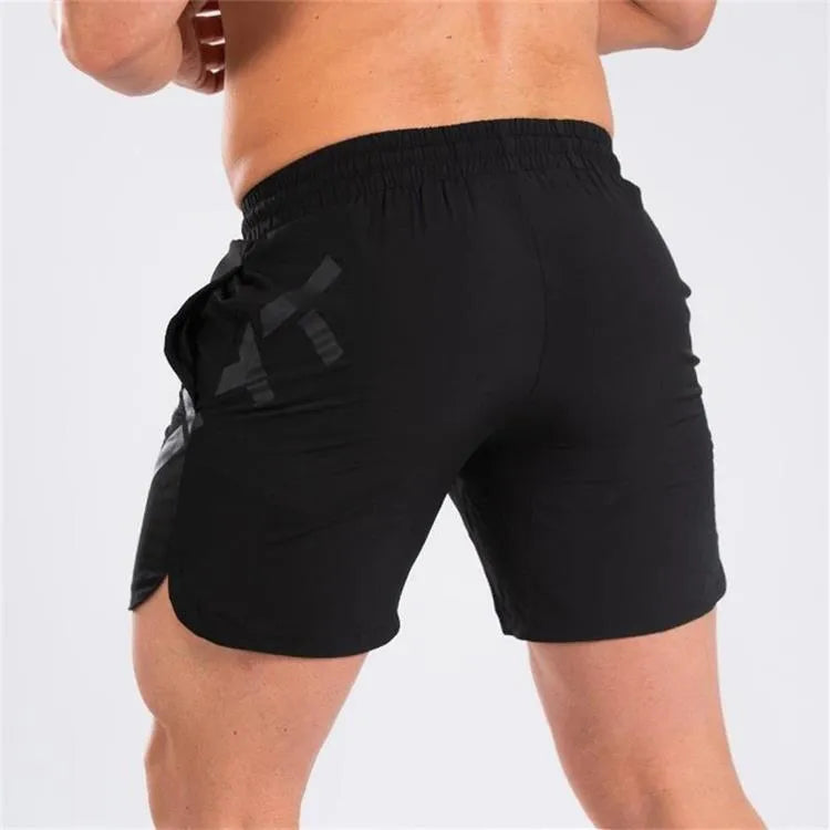 Men's black quick-dry elastic training shorts with knee-length design for summer sports