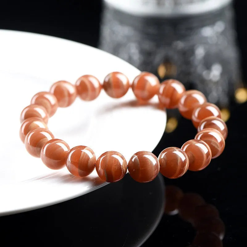 Natural old mine rhodochrosite round beads bracelet from Peru in 6mm or 8mm sizes with Ruyi elements