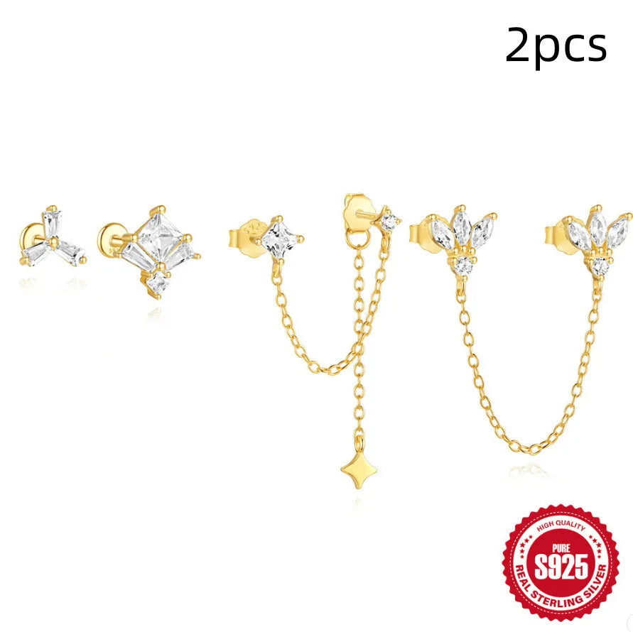 S925 sterling silver zircon stud earrings in golden geometric designs including clover, crown and chain styles