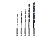 Set of five steel woodworking twist drill bits with hexagonal handles placed on a surface